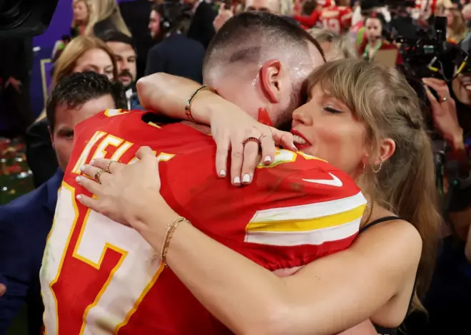 Taylor Swift-Travis Kelce Wedding Details Emerge: An Original Adam Sandler Song, “Blank Space” Handkerchiefs at “Intimate” Garden Ceremony