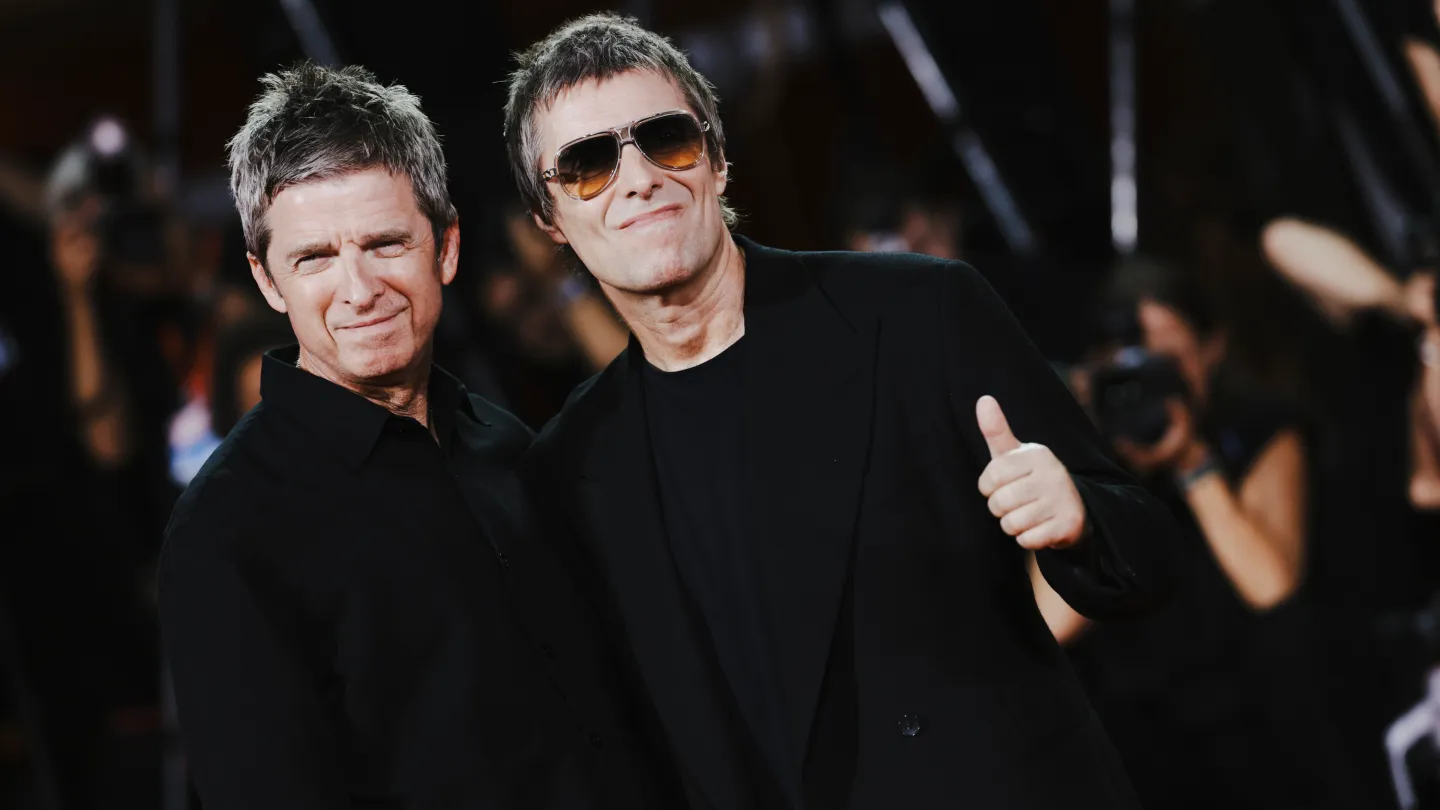 Liam and Noel Gallagher Lock Arms at Venice Premiere of ‘Oasis: Don’t Look Back in Anger’