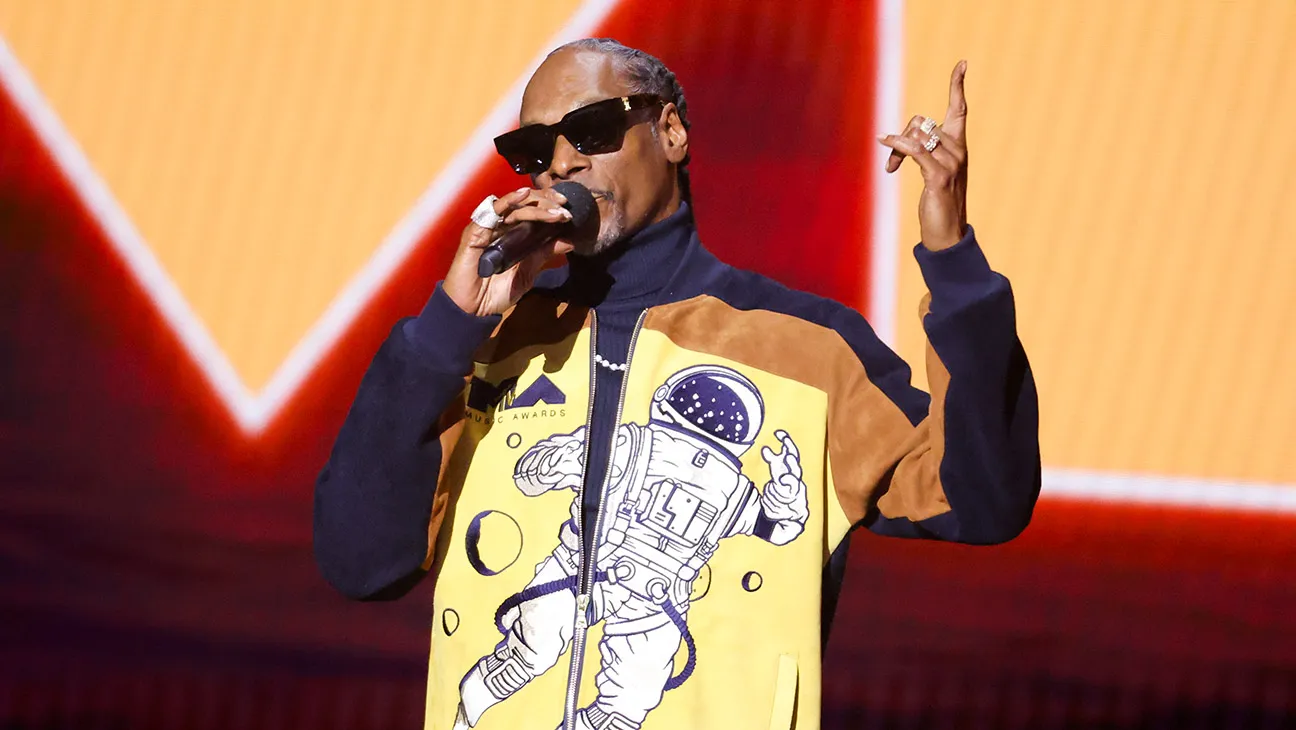 Snoop Dogg Pokes Fun at Madonna in VMAs Monologue: “She Ain’t a Virgin No More”