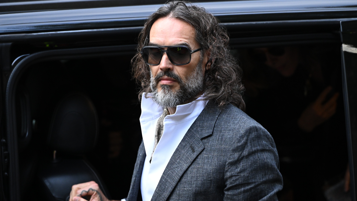 Russell Brand Arrives at London Court for Start of Rape Trial